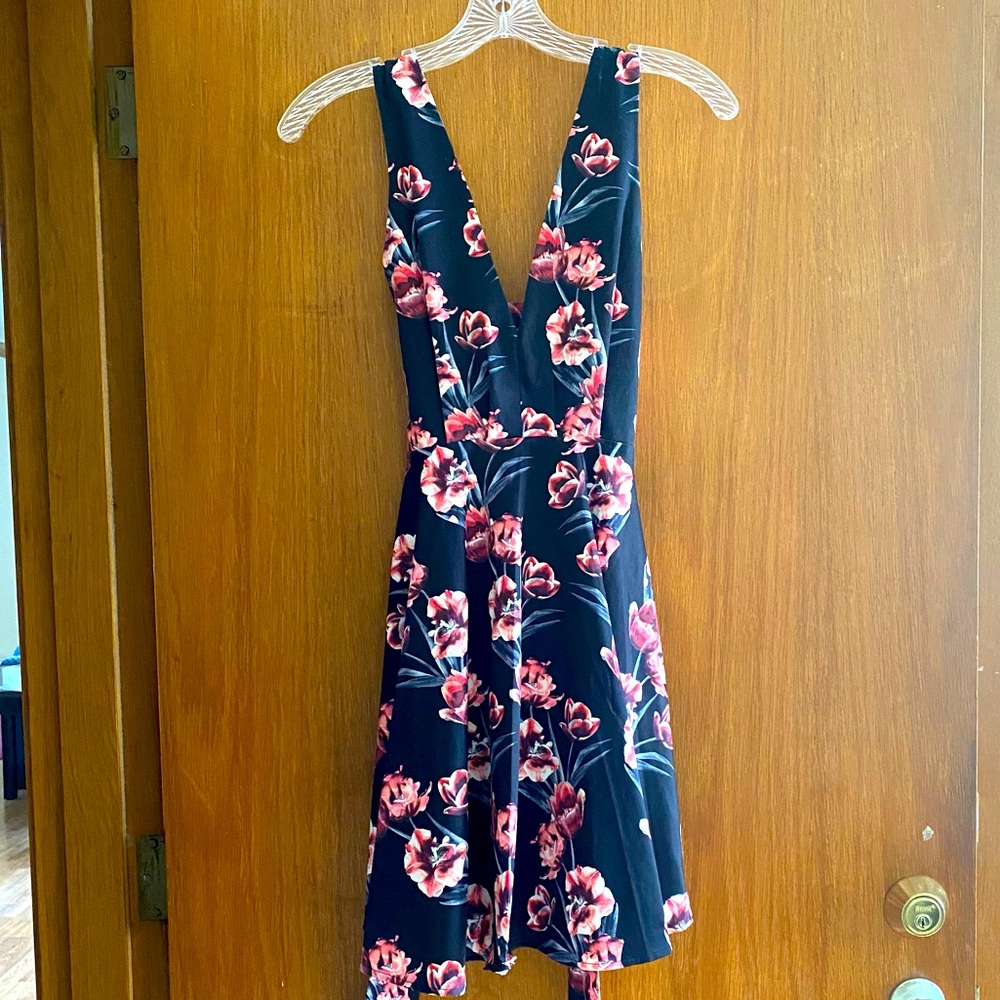 Buttery soft cocktail dress with florals from #akira in very good condition.